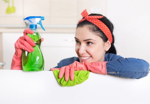 Technician performing deep steam carpet cleaning on carpet fibers